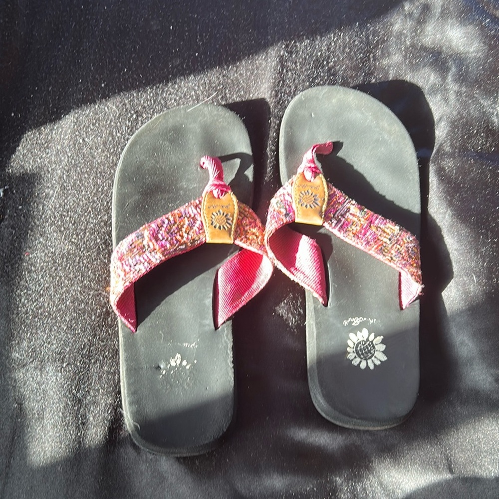 yellow box flip flops with sparkles
